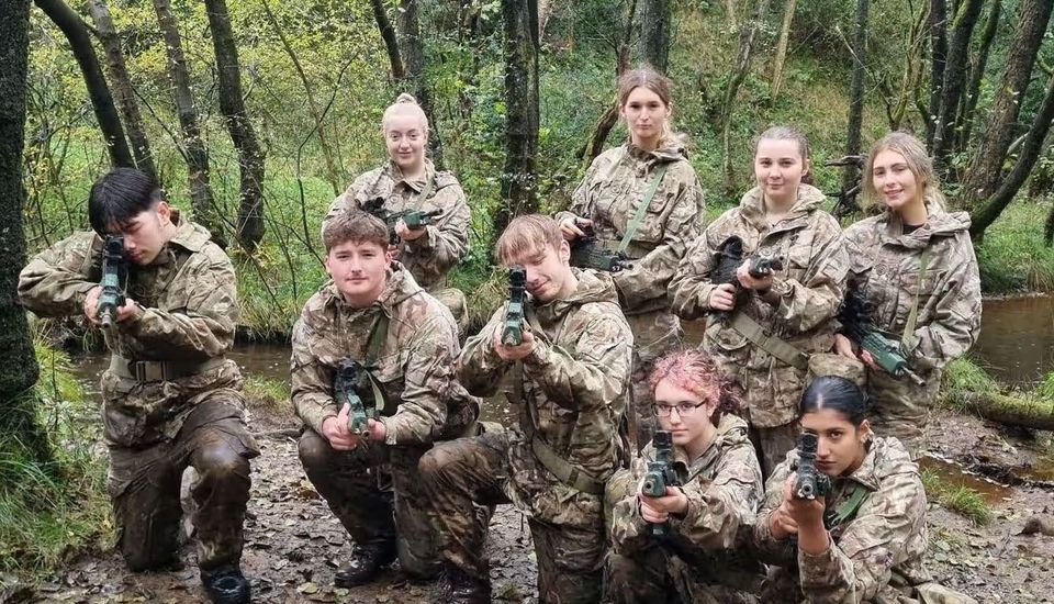 Students posing in army uniforms