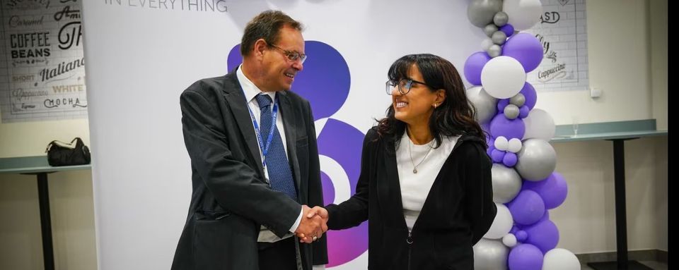 Photograph showing Principal Stuart Merrills celebrating results with a student