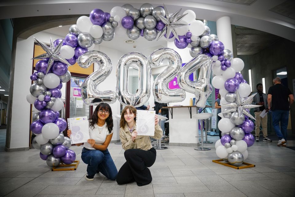 Image of a student celebrating receiving their results