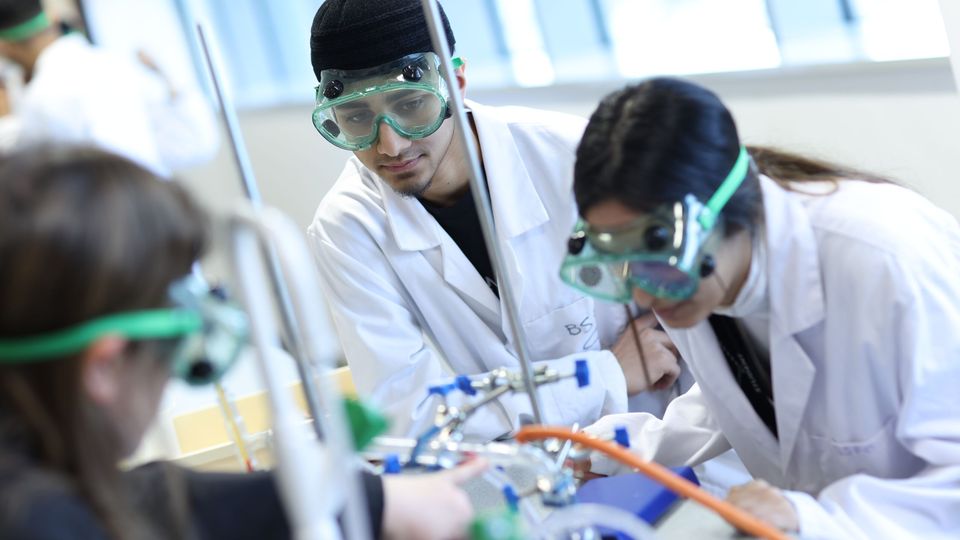 Image of students carrying out science experiment