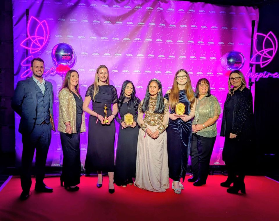 Group image of people at awards ceremony