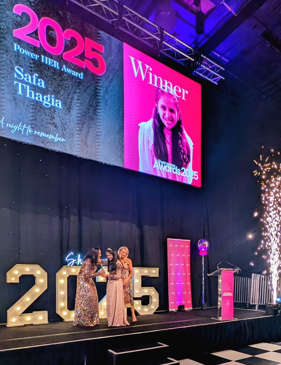 Image of student receiving award